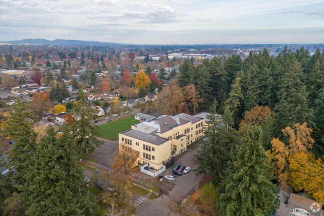 Surrounded by fall colors and the surrounding neighborhood, Englewood Elementary stands tall.