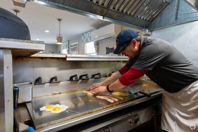 A chef at Charlie's Diner in Merrimack cooks a breakfast dish.