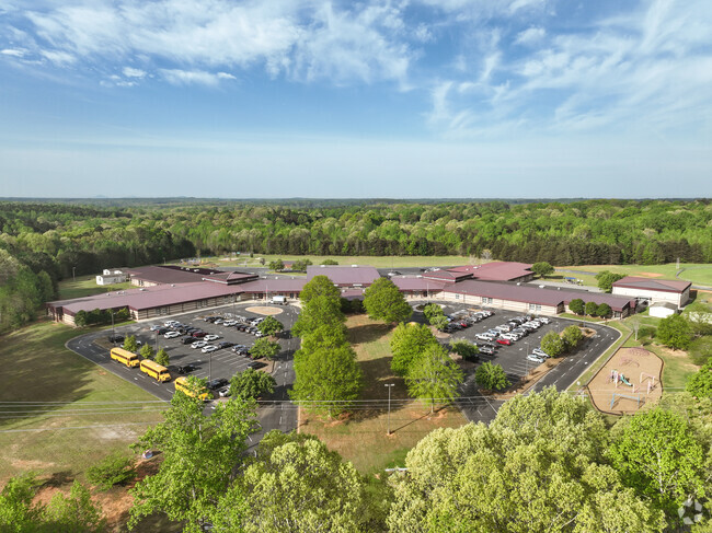 There are 2 schools on the large campus called Pumpkin Center.