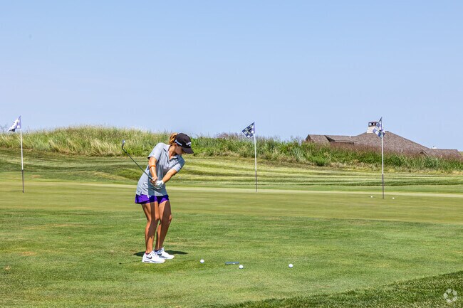 Students, friends and pros are golfing at Colbert Hills Golf Course in Manhattan.