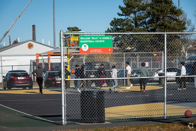 A nice day at the basketball court at the Alfred Lima Elementary School in Providence.