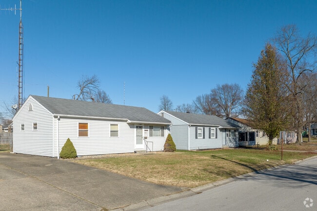 This is a row of older style ranch homes in Sellersburg, Indiana.