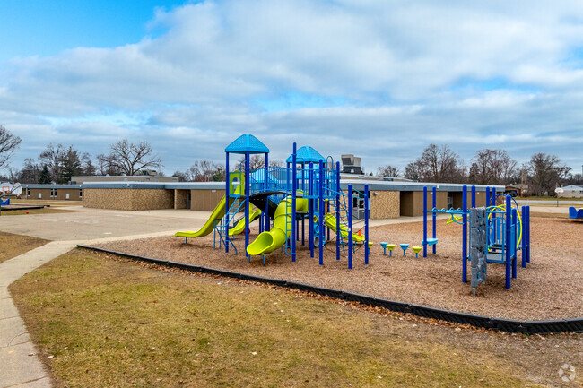 Children enjoy modern and fun playground equipment at Randolph Elementary School.