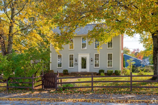 A historic colonial home with exquisite fall colors in downtown Danville.