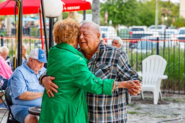 A couple dances to the live music at one of the many restaurant bars in Tavares.