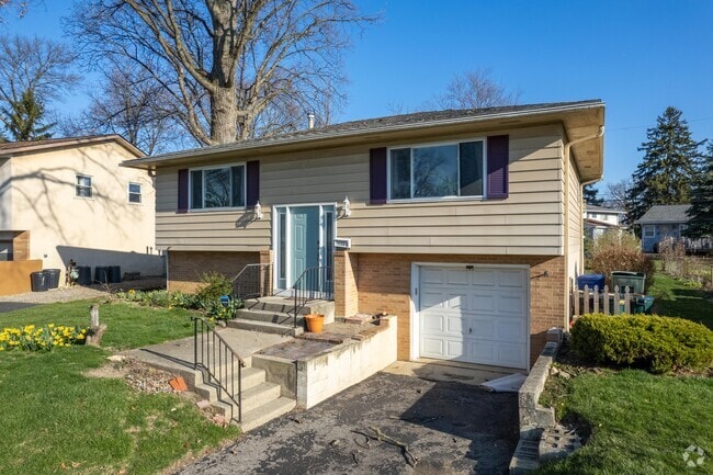 A quaint split-level home with a single-car garage in Devonshire.