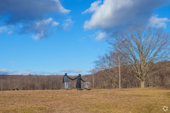 Families can always hold hands as they embrace the beauty at Plug Pond in Haverhill.