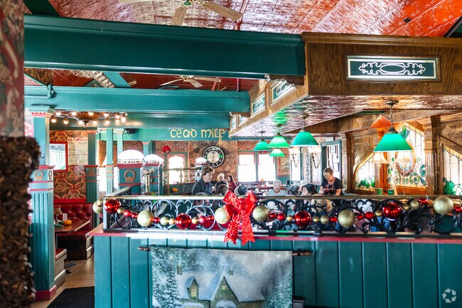 A wonderful restaurant in Getzville delights the senses with bright colors and detailed ceiling.