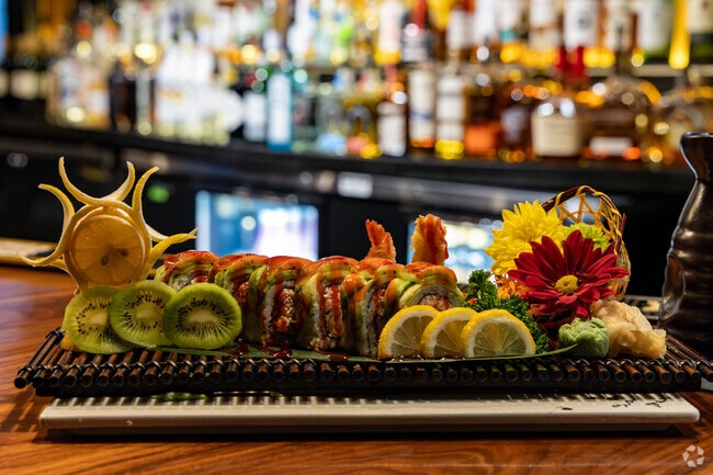 Sushi Masa in Acadiana Wood, Lafayette makes fruit-topped sushi rolls that are amazing.