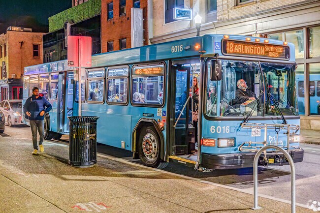 Buses stop along East Carson Street in Southside Flats all hours of the day.