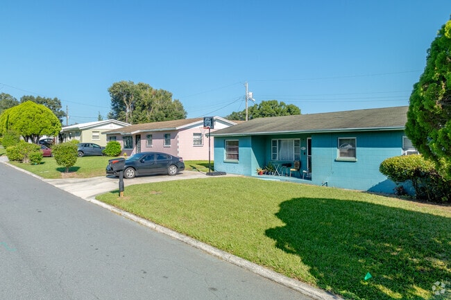 Colorful homes line many Webster Park streets, highlighting the freedom from HOAs.