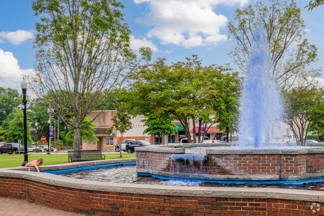 Take the kids to play around the fountain at the Opelika Courthouse Square.
