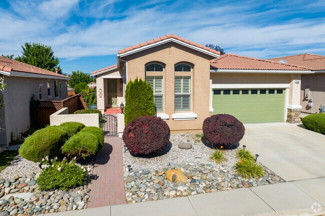 Rounded clay tiles comprise all of these Spanish-Style roofs in D'Andrea.