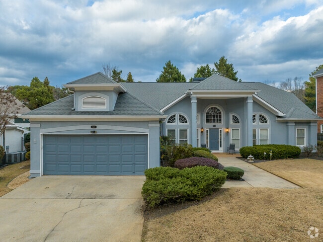 Colorful single-story homes with simple landscaping can be found in Biltmore Acres.