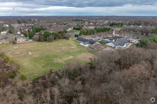 The multi-purpose sports fields are located behind the school building.