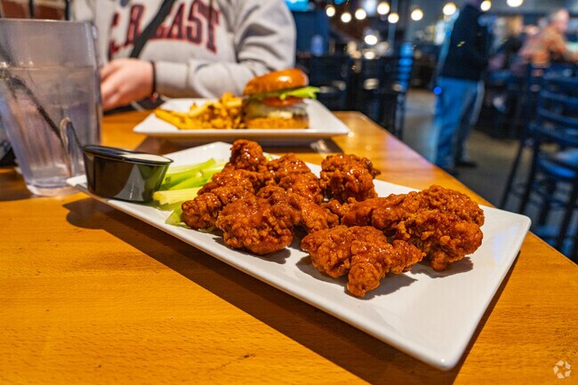 Enjoy tasty wings at Seven Sports Bar & Grille while you watch the games in New Freedom.