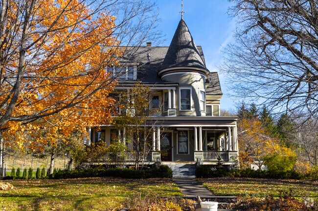 Historic Victorian homes line tree-shaded streets in Chatfield’s older neighborhoods.