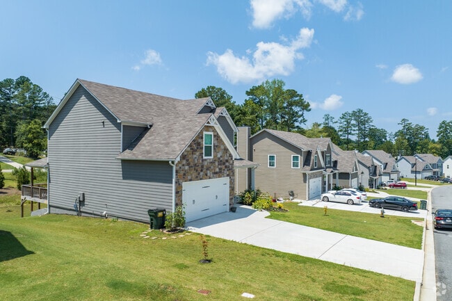 Houses in Cedarcrest feature wide driveways.