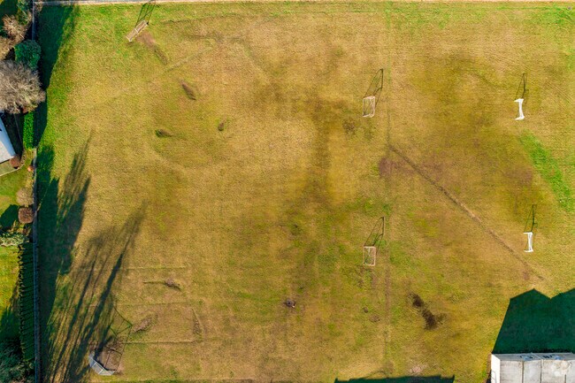 Views from above of large open green space at Byron Kibler Elementary School.