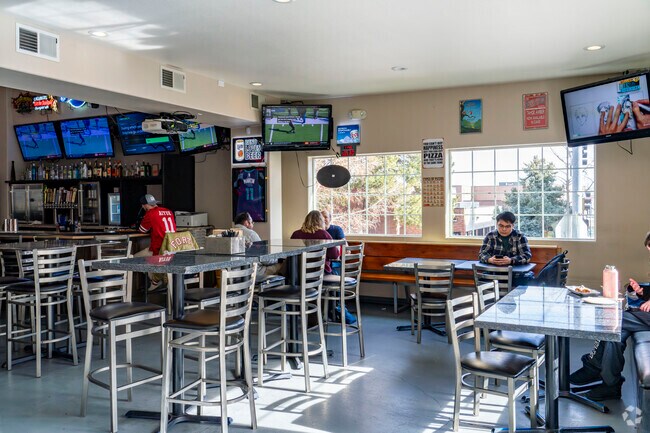 Rick's Pizza & Beer is a popular sports bar in the heart of West University.