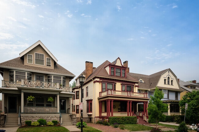 Wide porches with second-story balconies add outdoor space to these homes in Elmwood Bryant.