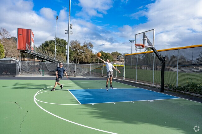 Challenge your friends to a game of basketball at Giorgi Park.