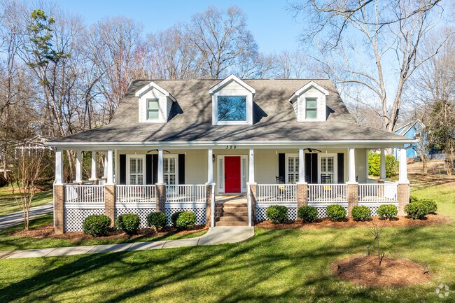 You can find colonial style homes with large front porches in Matthews.