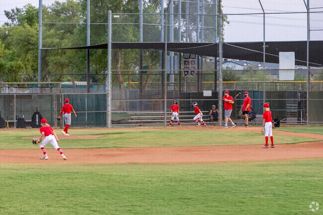 Kids practice baseball at Crossroads District Park in Gilbert.