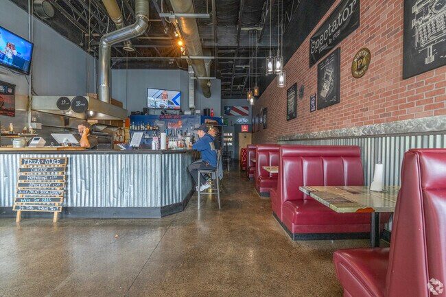 Warm atmosphere at Spectator Pizza & Pub in the Parker Crest neighborhood.
