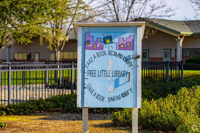 Cute free little library stands front of Barrett Ranch Elementary School.
