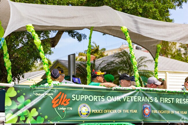 Residents joyfully celebrate St. Patrick's Day at the vibrant parade in Delray Beach.