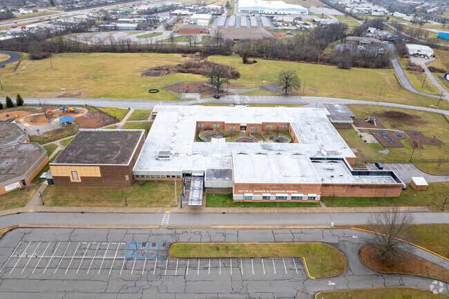 The student population of Hattie C. Warner Elementary School is 497 and the school serves 1-5.