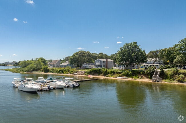 Some homes in Teaticket share private docks for their water vessels.