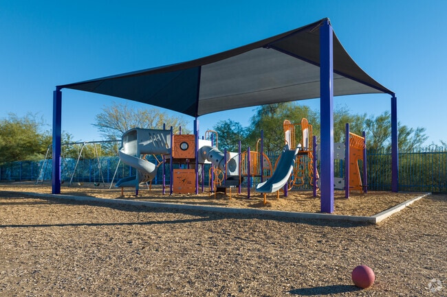 children love playing on the new covered playground at Los Amigos Elementary School in Tucson