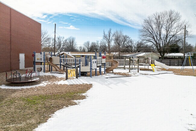 Kids can climb on the playground at St Anne Elementary School.