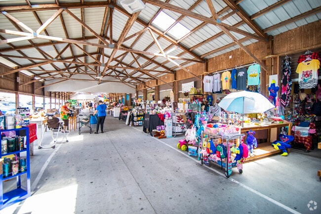 Oak Grove residents enjoy exploring vendors' stalls at the Barnyard Flea Market.
