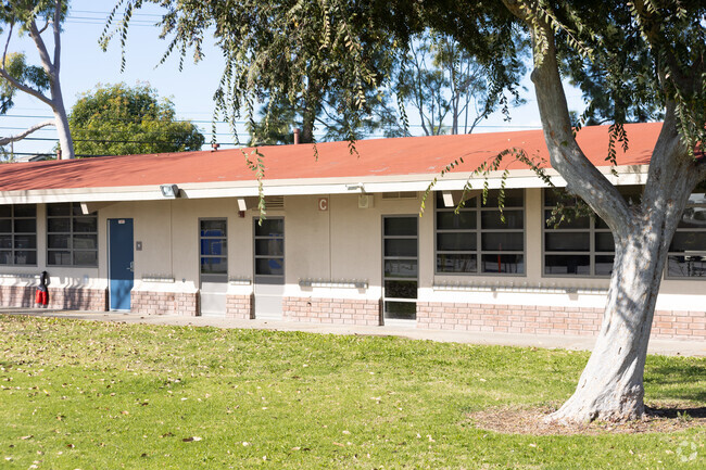King Elementary has green fields and trees in Cypress.