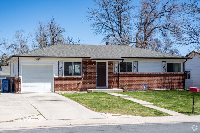 There are modest ranch brick single family homes with single car garages in East Westminster Colorado.