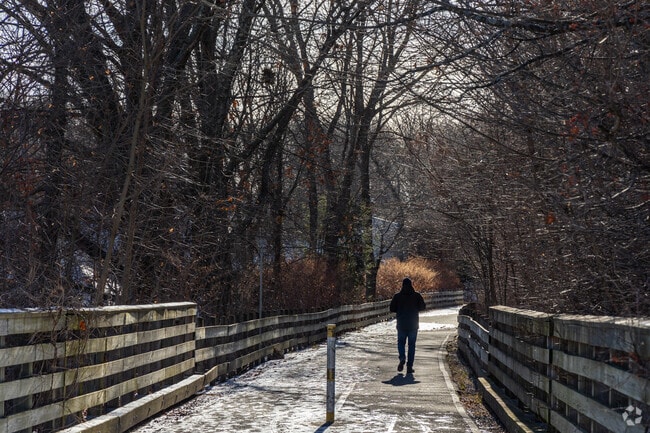 Downtown Hudson residents enjoy walks along the Assabet Rail Trail during all seasons.