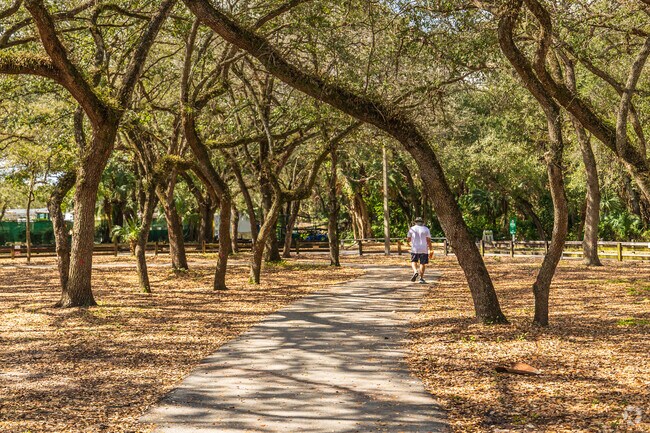 Take walks under shaded oak trees at Kendall Indian Hammock Park, near The Crossings.