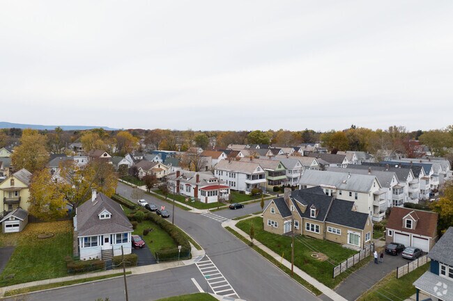 Mount Hope, Albany, NY, exudes a warm and neighborly atmosphere in an urban setting.