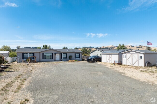 A typical ranch home and property are located along Highway 138 in Glide.