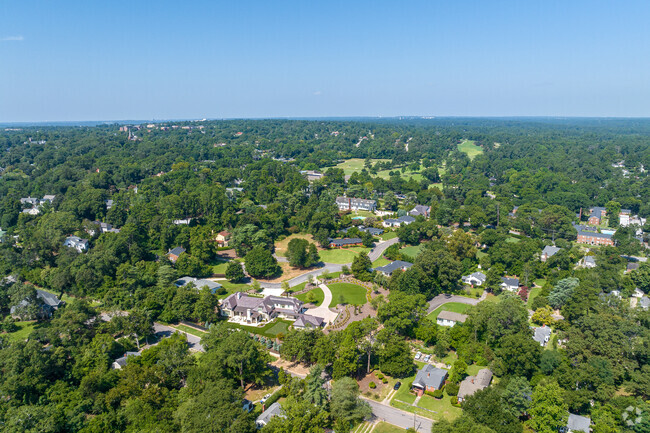 The densely wooded area surrounding Harrisburg provides residents with shade in the summer.
