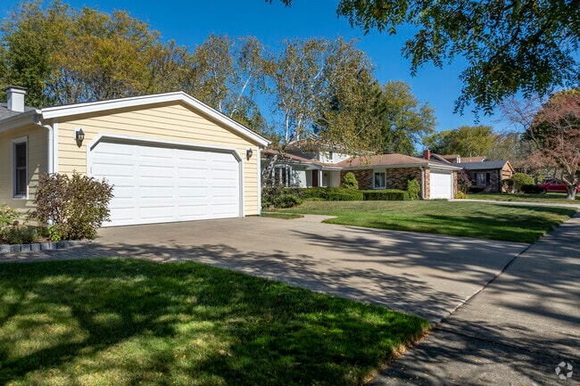 Homes in Greentree sit on full-sized lots with attached garages.