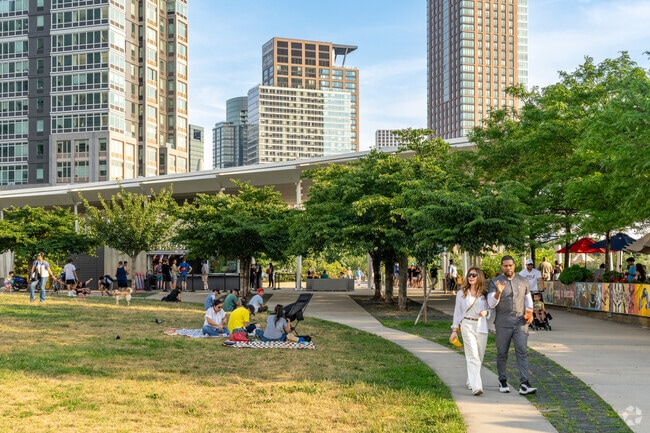 Residents enjoy walks through green spaces in the Hunter's Point section of Queens.