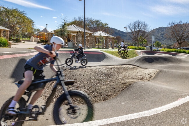 Bikers love the pump track in the Wolf Creek neighborhood.