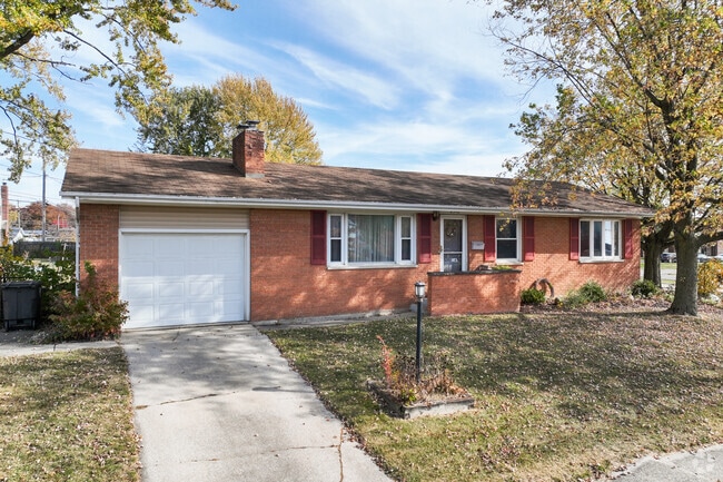 Well-manicured homes line the streets of Brentwood Park in Fort Wayne.
