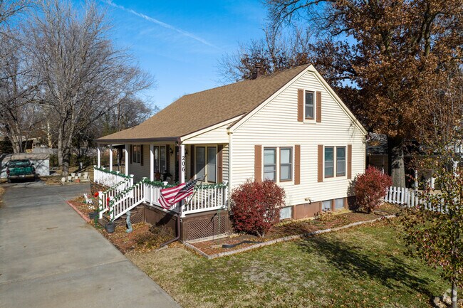 This Bungalow home in Hesston has a large front porch.