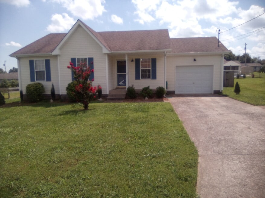 Wider driveway with pavers.
