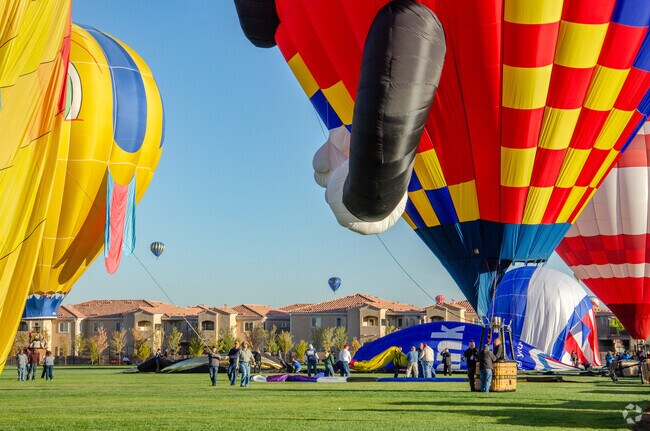 The Heights is 13 miles away from Balloon Fiesta Park.